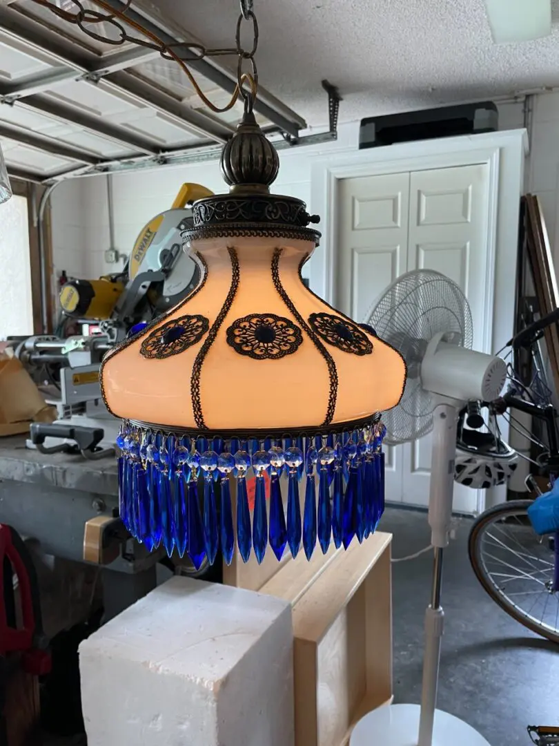 Image of hanging lamp with blue decoration