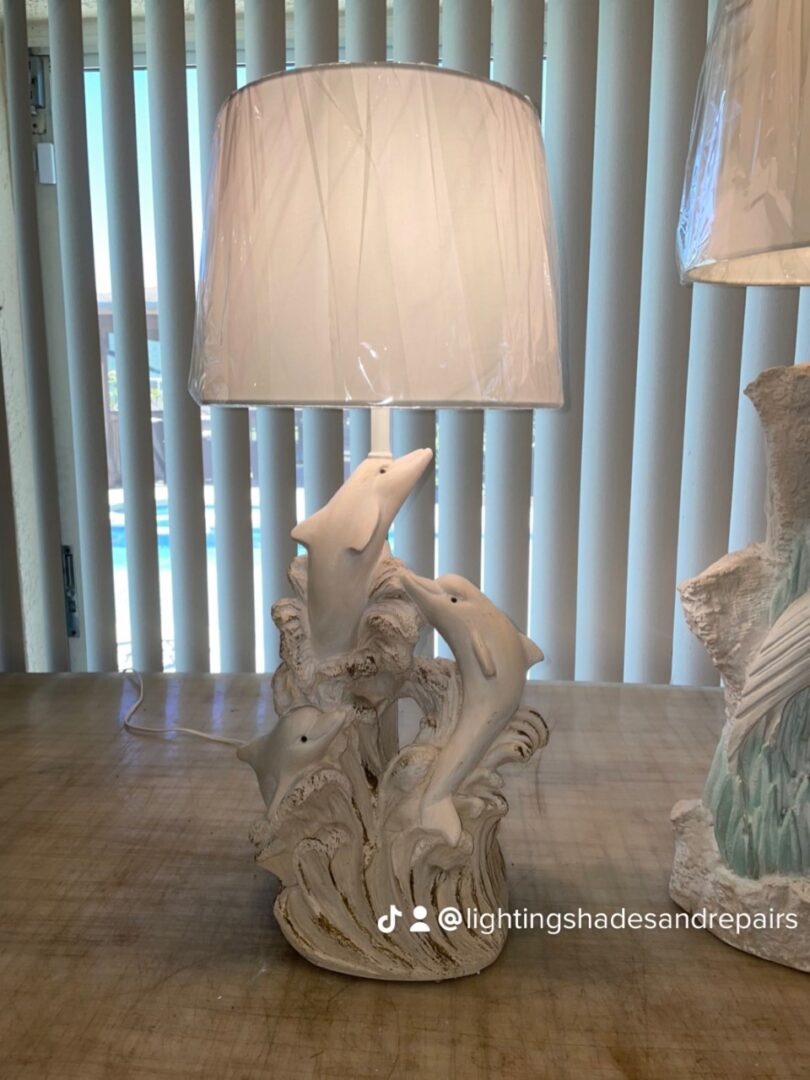 Image of white dolphin lamp