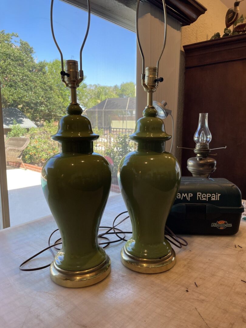 two lamps of same color on the table
